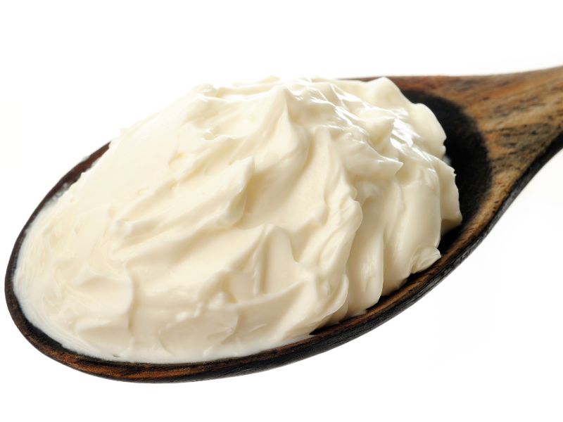 vegan cream cheese on spoon